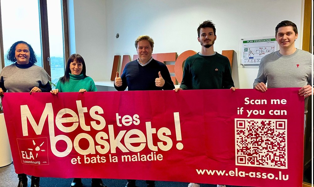 Intech (POST Luxembourg Group) : l’équipe avec la bannière ELA