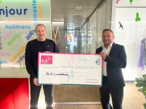 Remise du chèque de Babilou à ELA Luxembourg, au siège luxembourgeois de Babilou Family